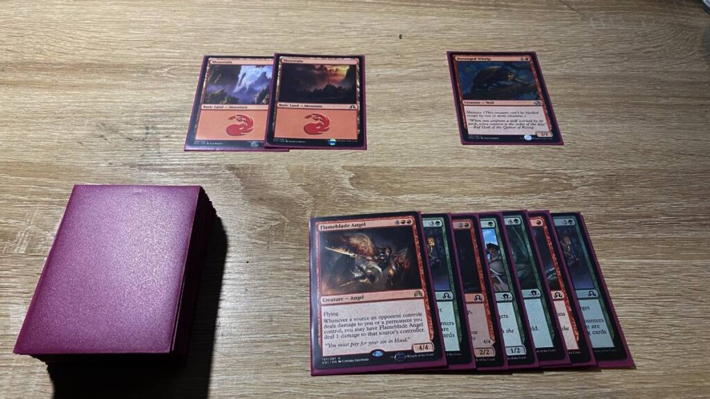 An example of mana screw in MTG.

There are two red lands and one red creature on the battlefield.

In the player's hand, there are 7 spells, with only one of them playable.